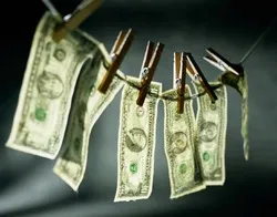 پولشویی چیست و چگونه کار می‌کند؟